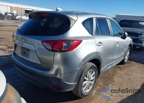 2015 Mazda Cx-5 Touring z USA, uszkodzony, nr VIN JM3KE2CY4F0432873